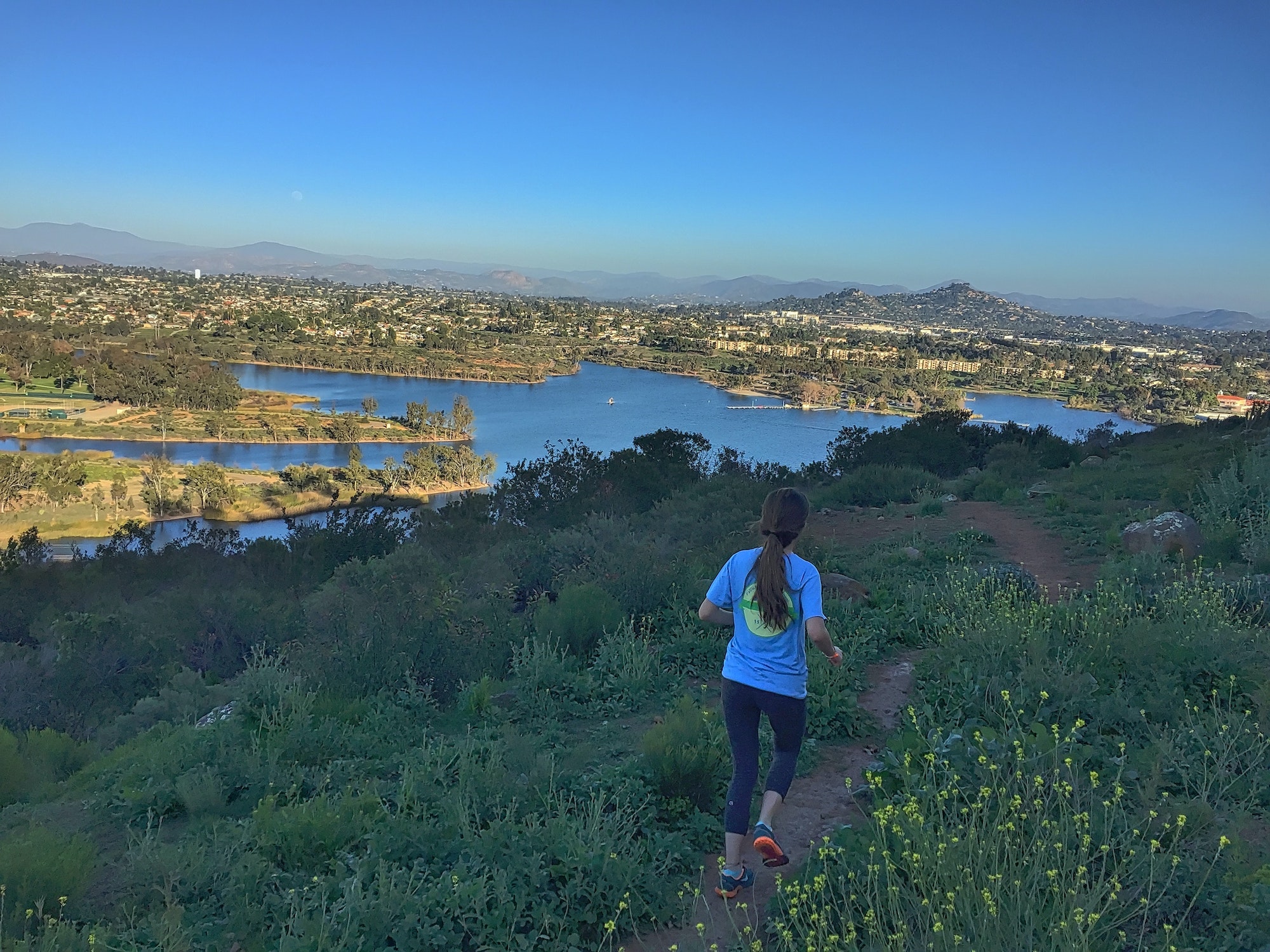 Running by the lake outside in nature